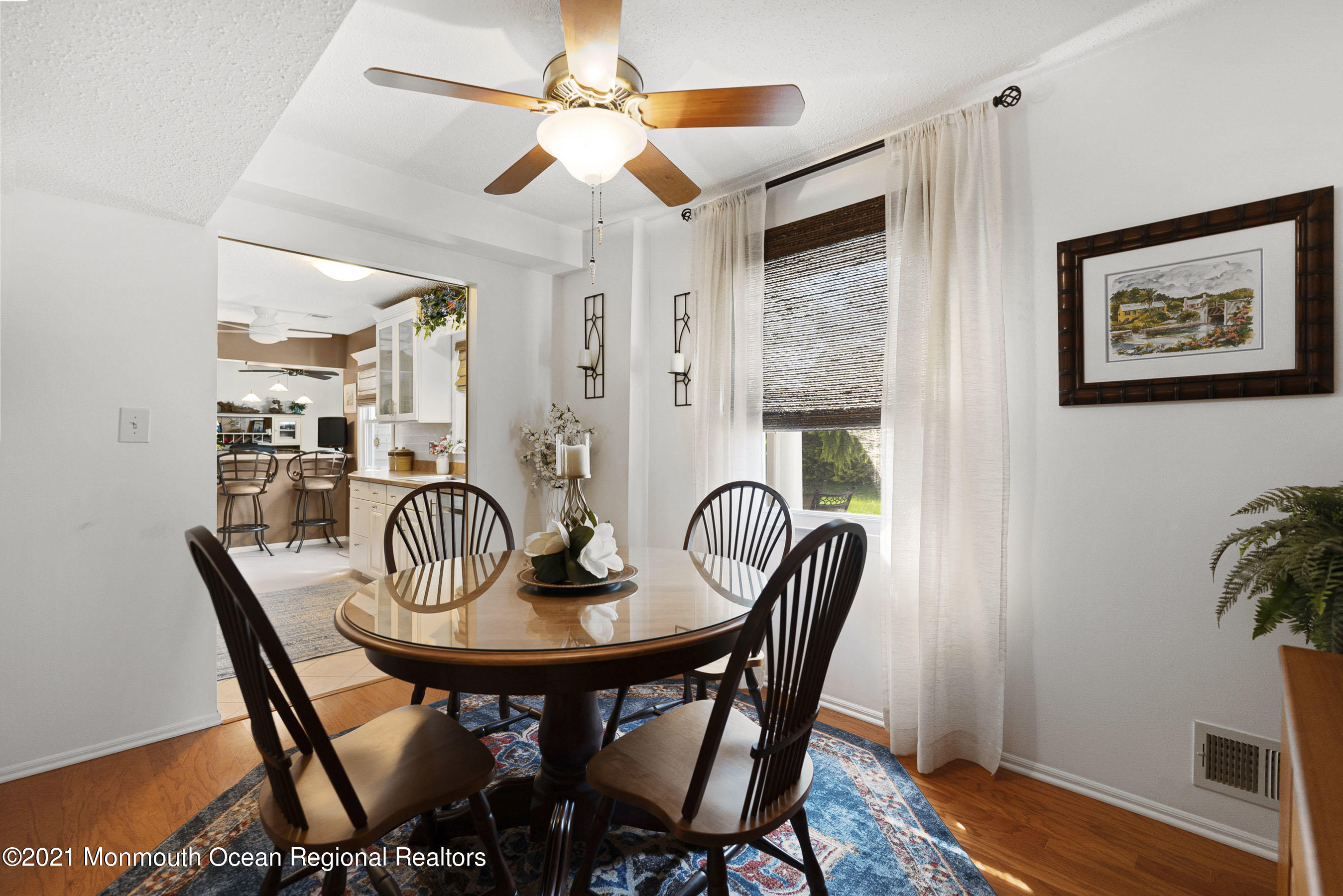 808 Constitution Drive Brick, NJ 08724 - Photo 9 of 27 a dining room with furniture and window