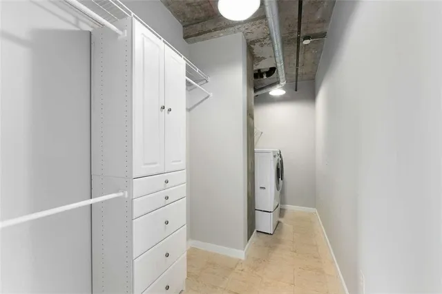 a view of a room that has a window