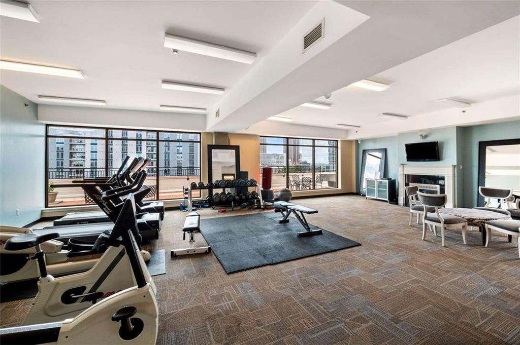115 West Peachtree Street Northwest, Unit 704 Atlanta, GA 30313 - Photo 31 of 35 a view of a room with gym equipment