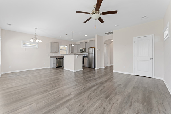 249 Samuel Street Pendleton, SC 29670 - Photo 24 of 33 This bright, open-concept living space features durable flooring and a contemporary kitchen.