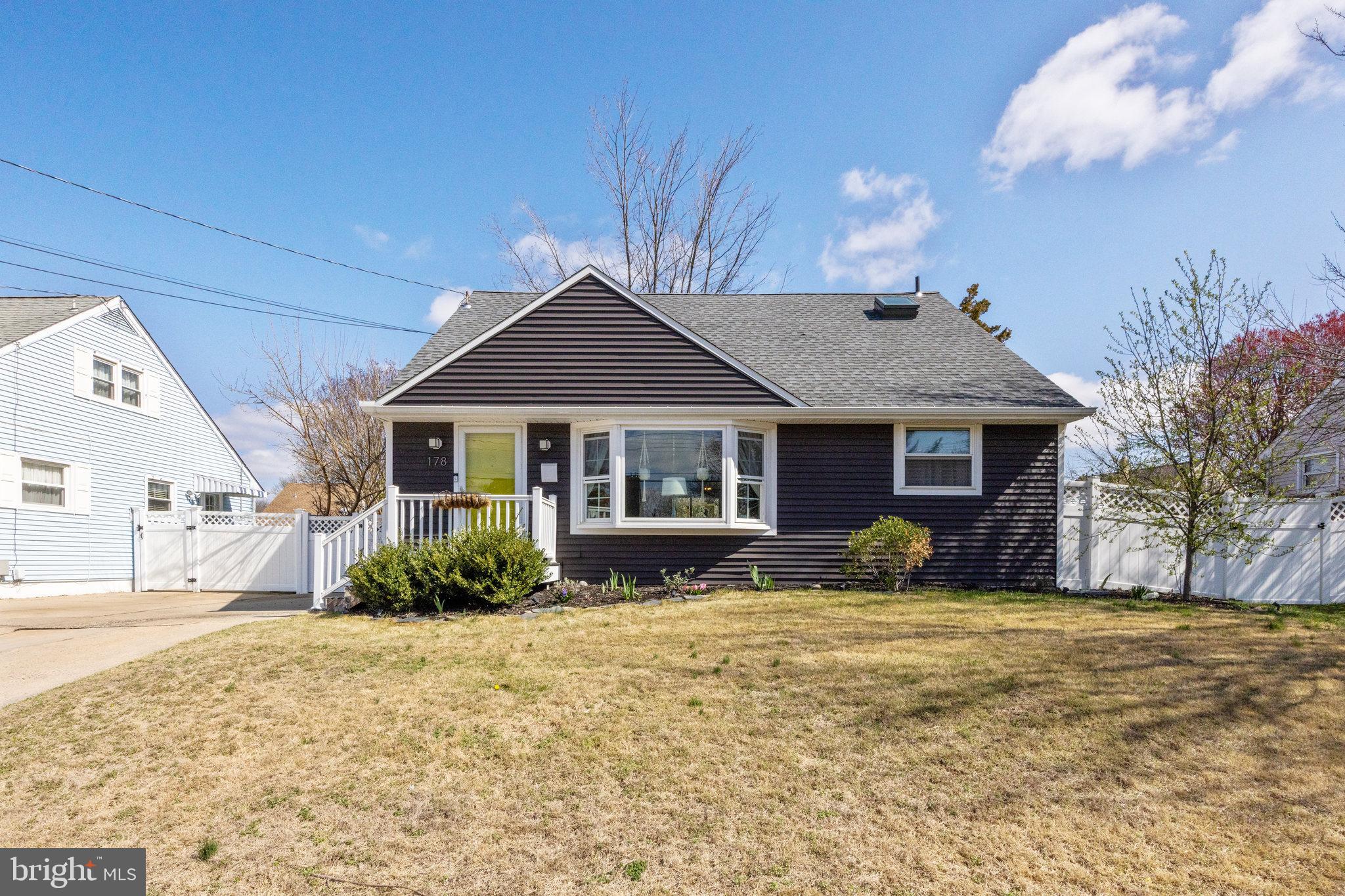 178 Devon Drive West Deptford, NJ 08096 - Photo 1 of 29 a front view of a house with a yard