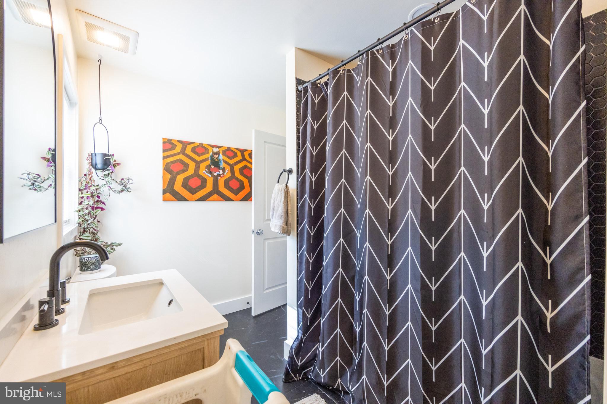 178 Devon Drive West Deptford, NJ 08096 - Photo 16 of 29 a bathroom with a sink and a mirror