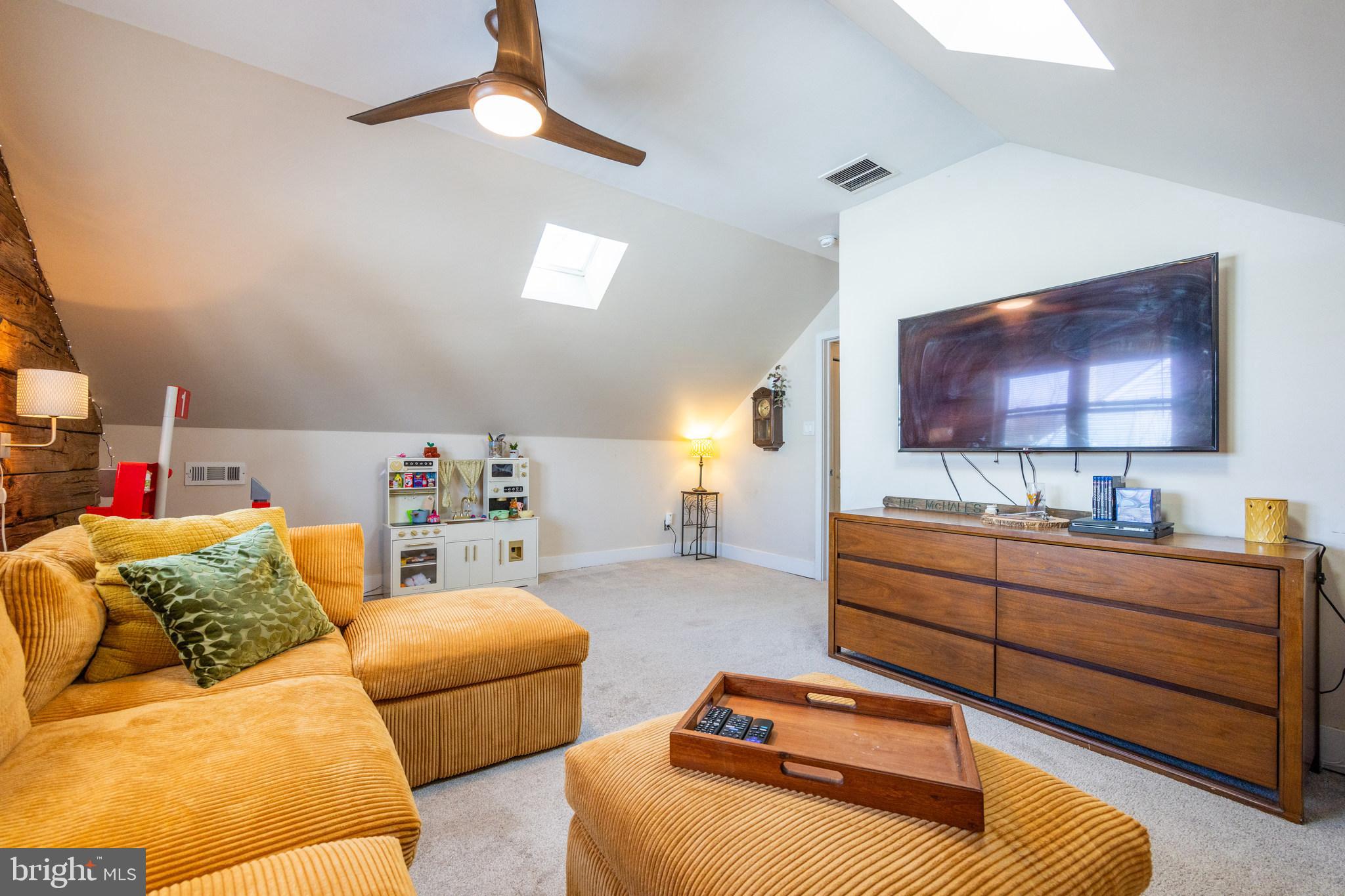 178 Devon Drive West Deptford, NJ 08096 - Photo 18 of 29 a bedroom with furniture and a flat screen tv