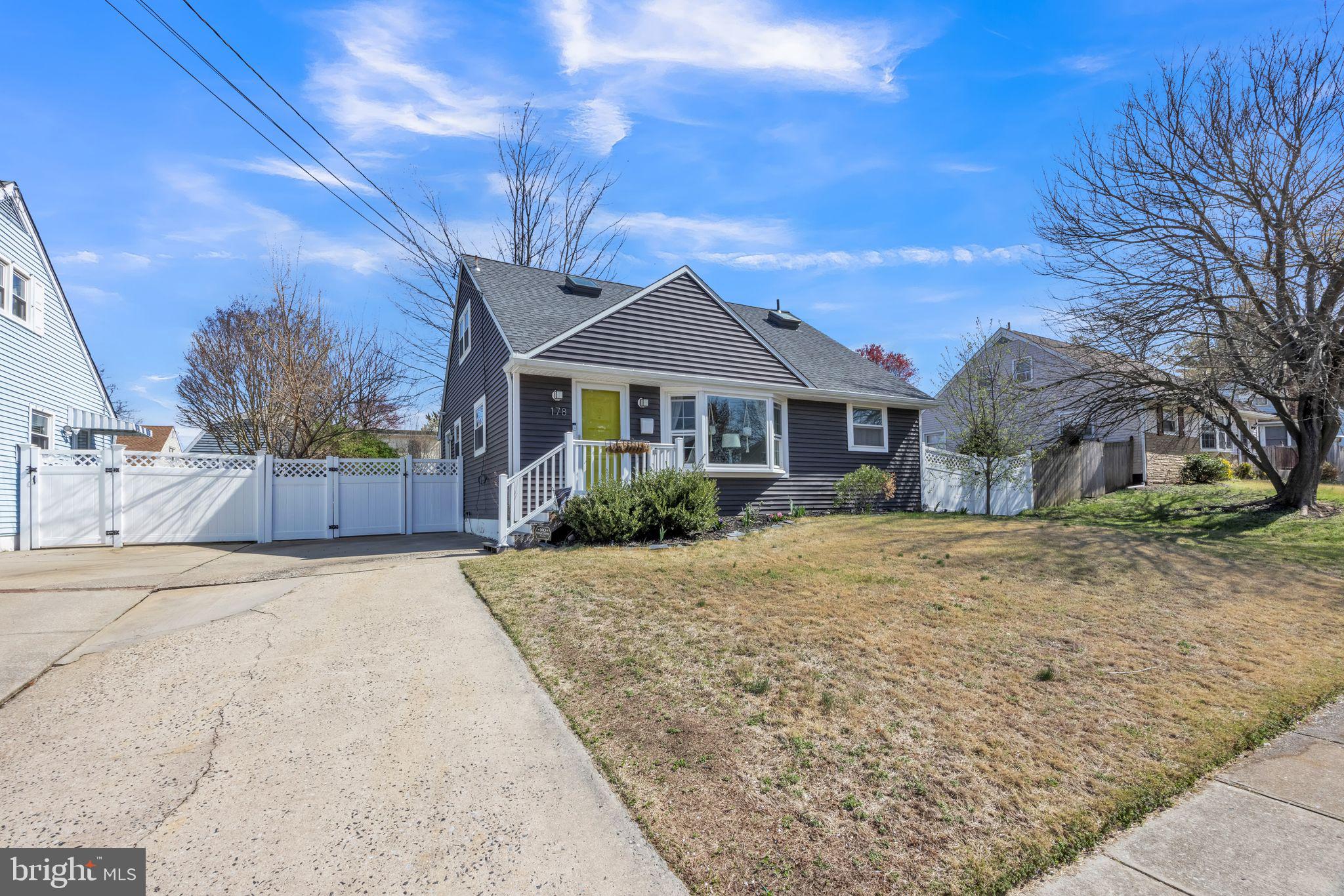 178 Devon Drive West Deptford, NJ 08096 - Photo 2 of 29 a front view of a house with a yard