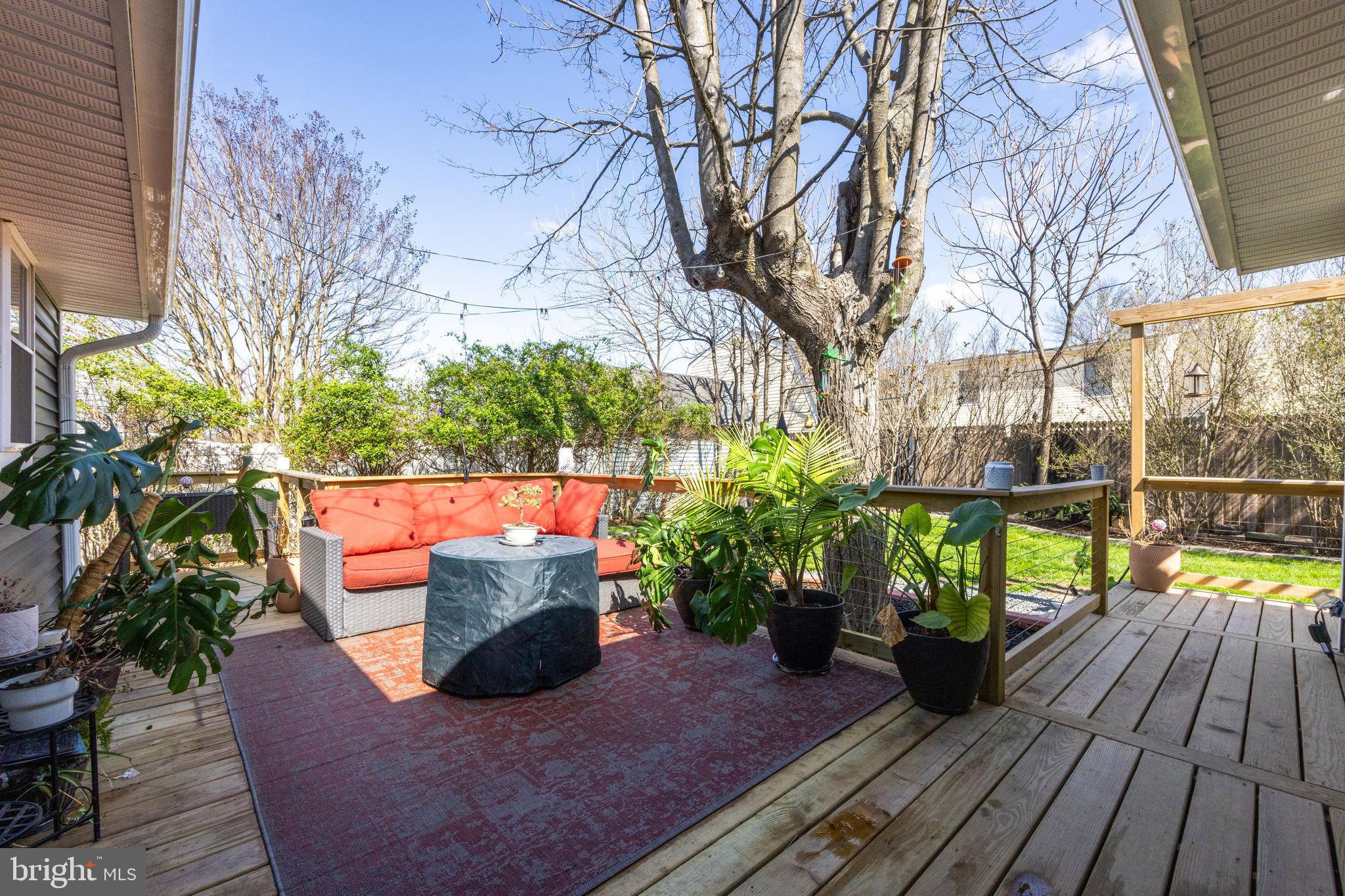 178 Devon Drive West Deptford, NJ 08096 - Photo 23 of 29 a wooden bench sitting in front of a building