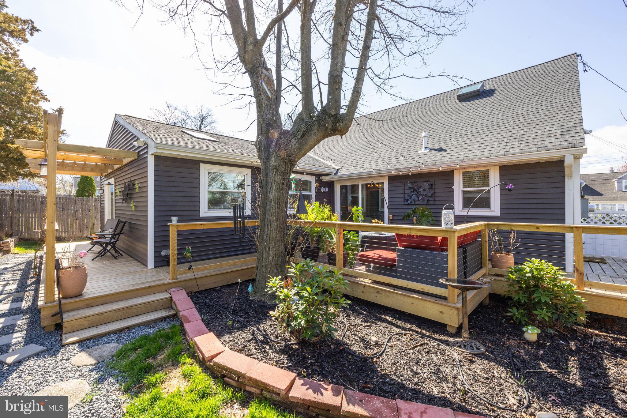 178 Devon Drive West Deptford, NJ 08096 - Photo 27 of 29 a view of a house with a chairs in patio