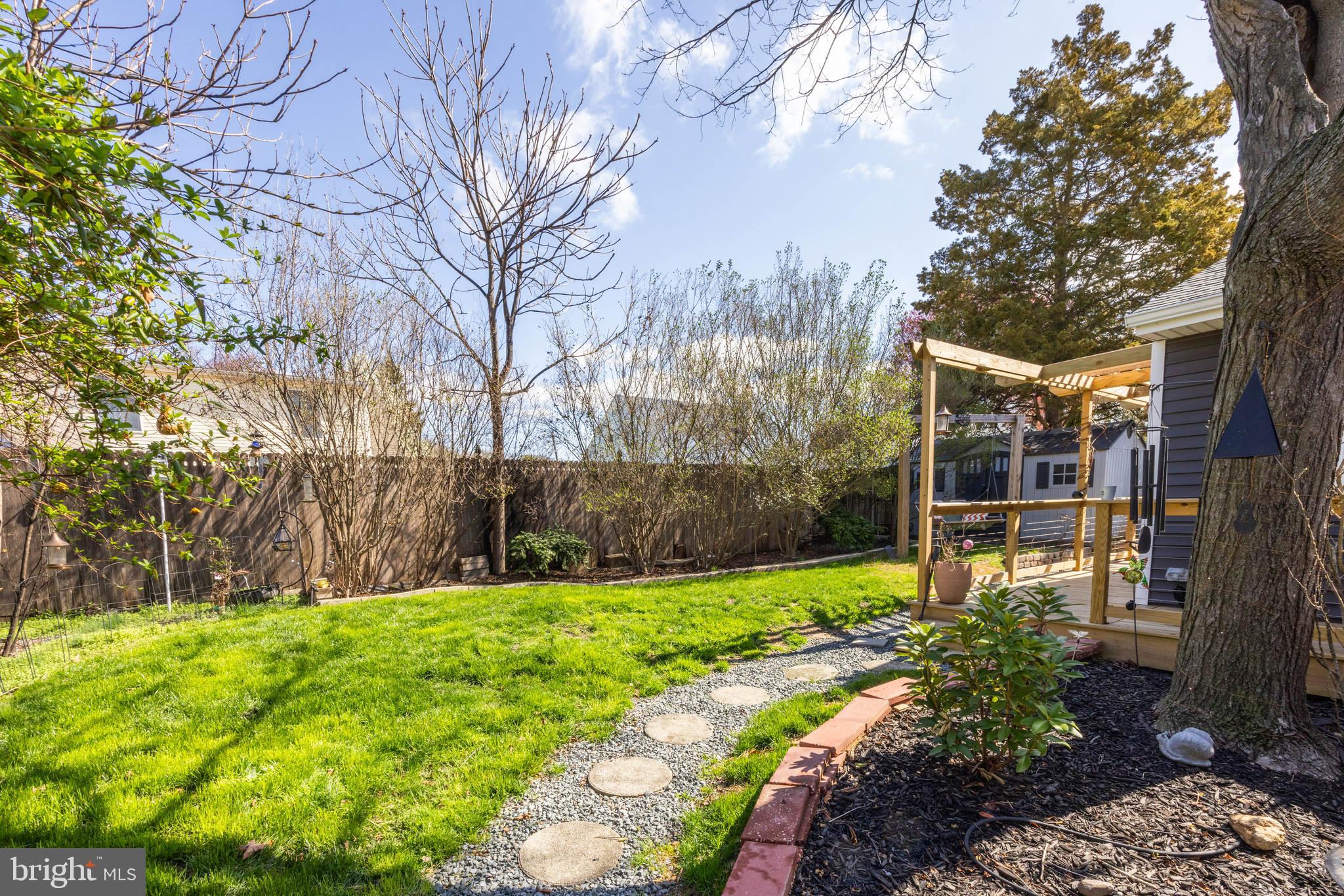 178 Devon Drive West Deptford, NJ 08096 - Photo 28 of 29 a front view of a house with garden