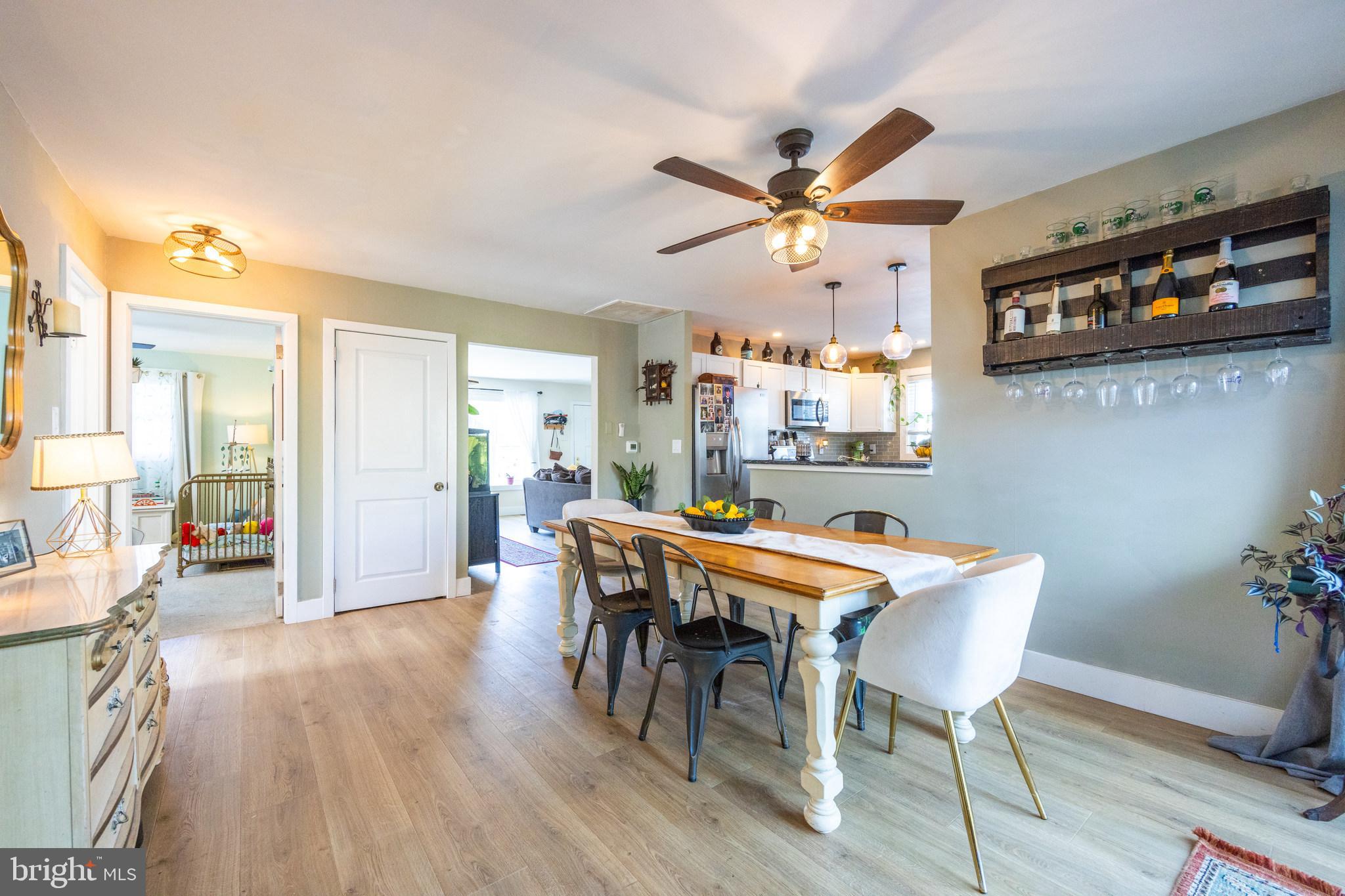 178 Devon Drive West Deptford, NJ 08096 - Photo 5 of 29 a view of a a dining room with furniture window and wooden floor