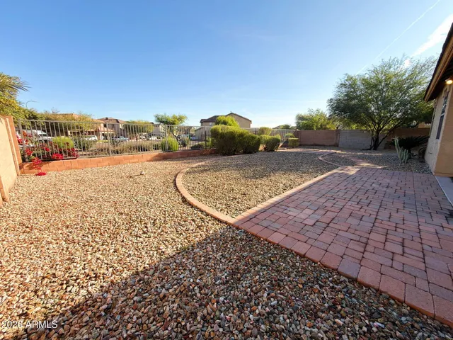 a house view with a backyard space