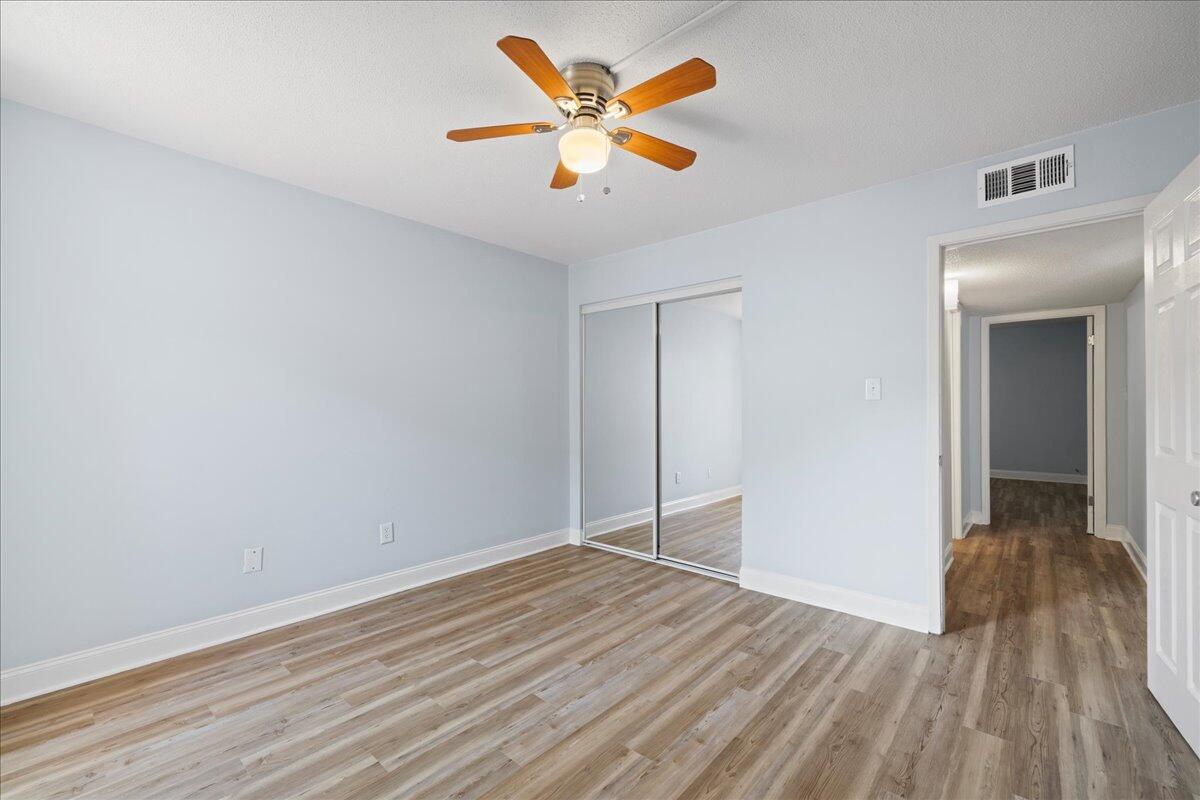 210 Pelham Road, Unit 204B Fort Walton Beach, FL 32547 - Photo 13 of 25 12-12-bedroom_back_overlooking_closet