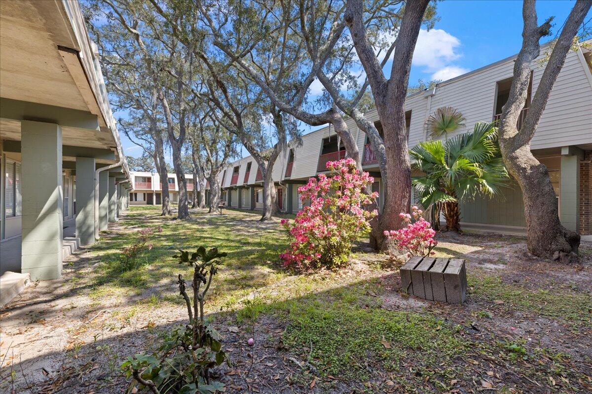 210 Pelham Road, Unit 204B Fort Walton Beach, FL 32547 - Photo 21 of 25 20-21-exterior_courtyard