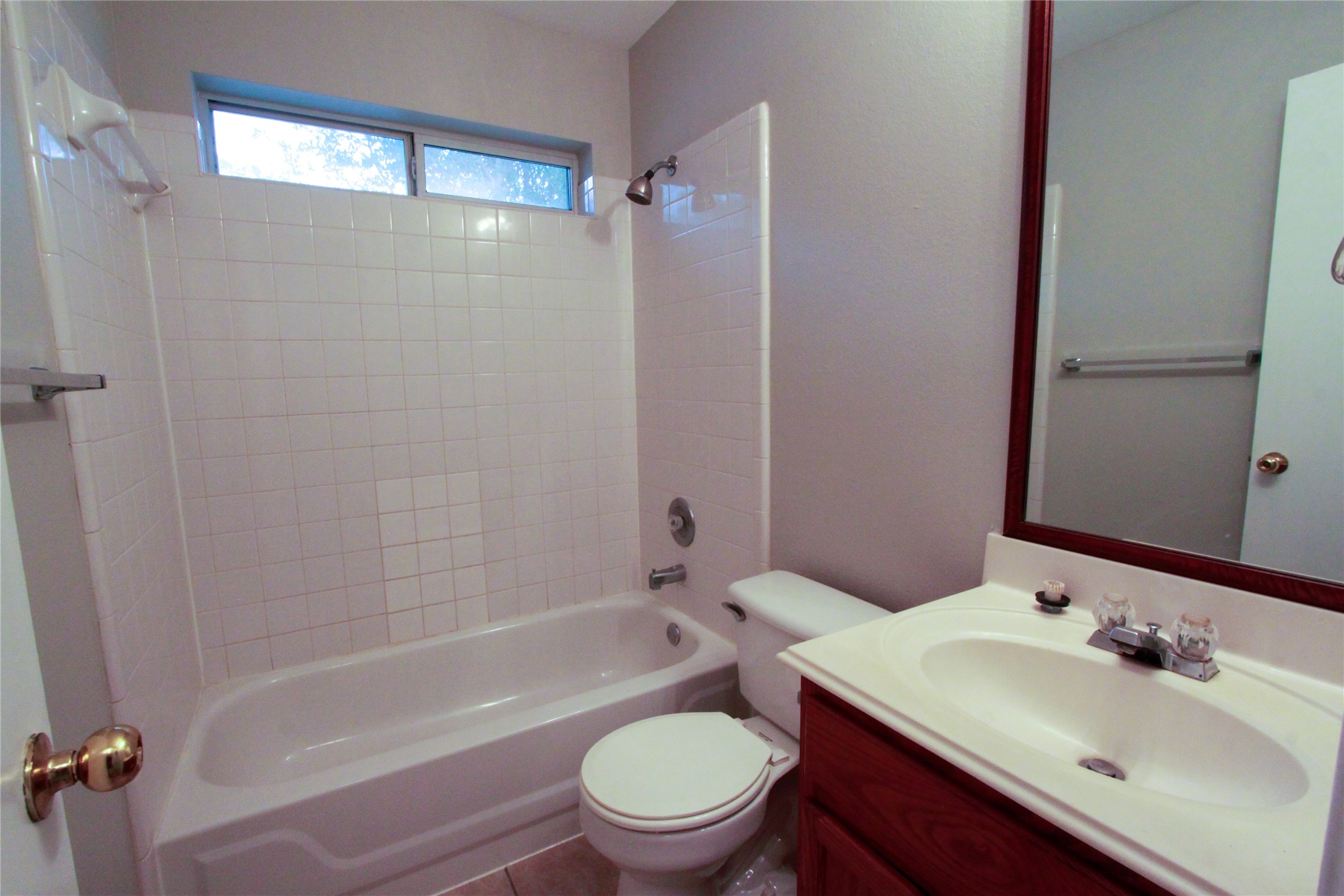 14708 Highsmith Street Austin, TX 78725 - Photo 24 of 28 Bathroom featuring vanity and shower / bath combination