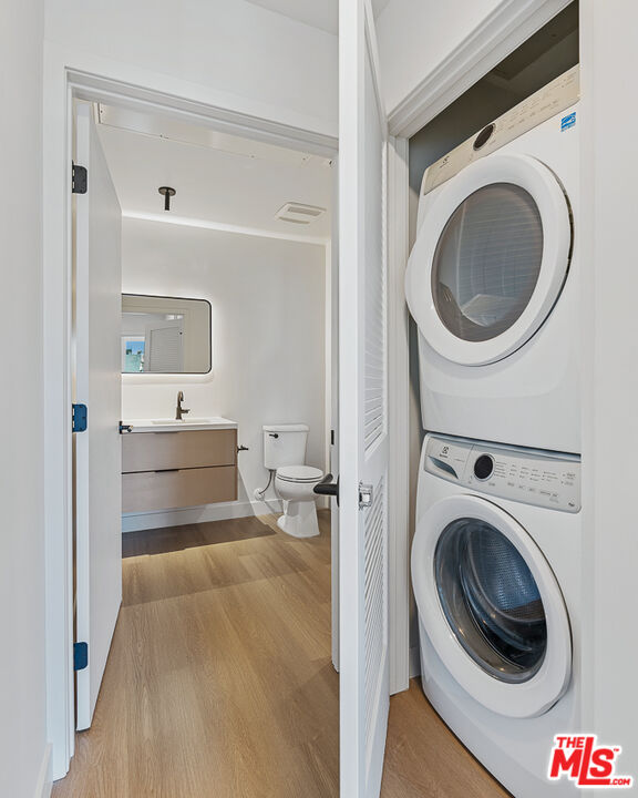 10601 Washington Boulevard, Unit 217 Culver City, CA 90232 - Photo 12 of 29 a view of a hallway with washer and dryer