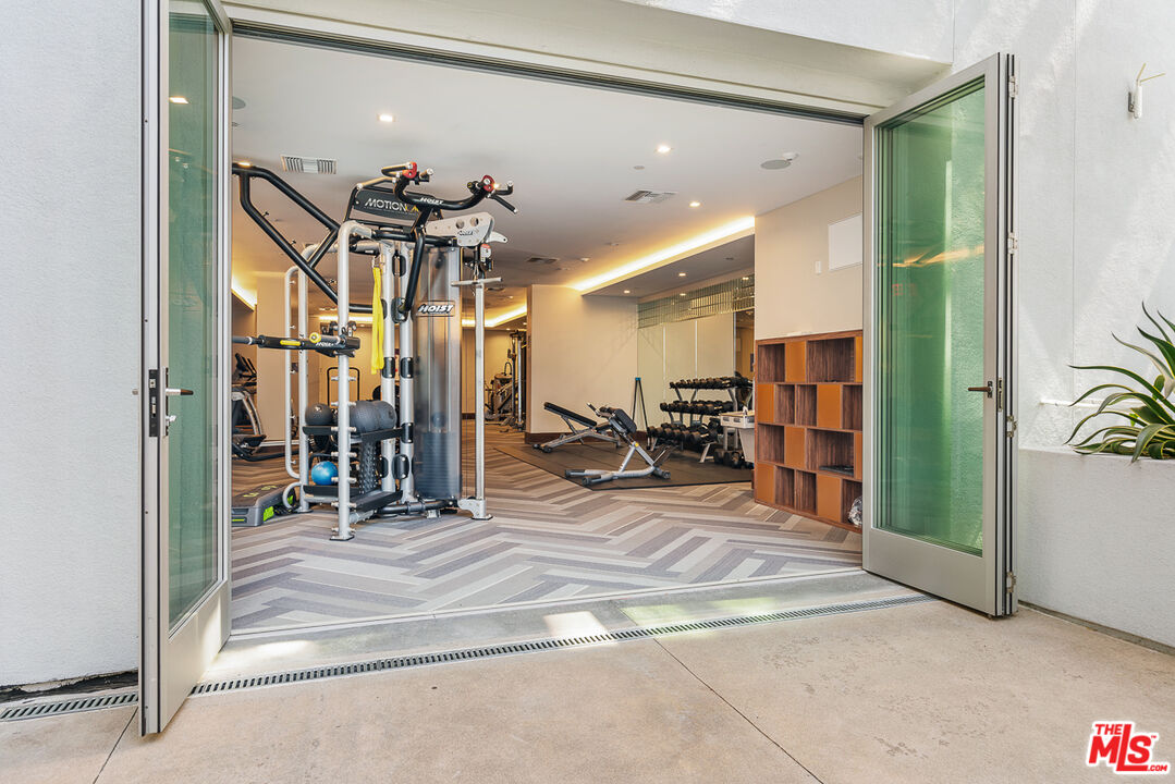 10601 Washington Boulevard, Unit 217 Culver City, CA 90232 - Photo 25 of 29 a view of a room with gym equipment
