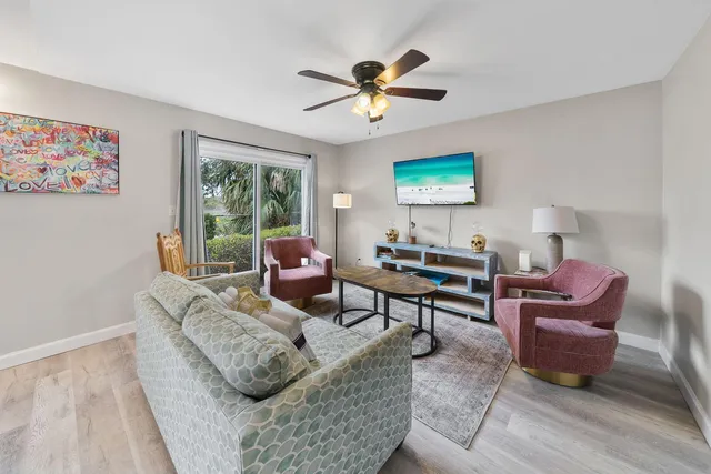 a kitchen with cabinets appliances a sink and a counter space