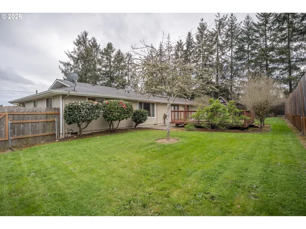 a front view of house with yard and seating area