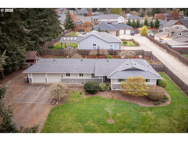 a view of a house with a garden