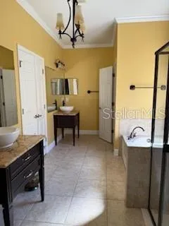 a dining room with a table and chairs