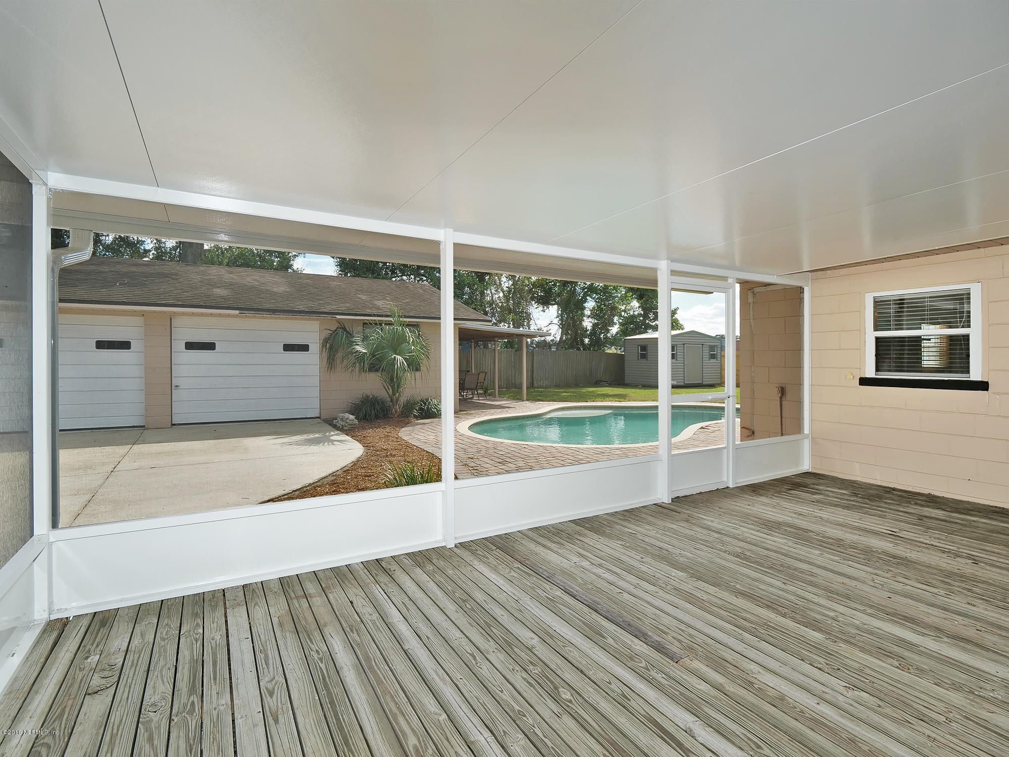 4538 Cambridge Road Jacksonville, FL 32210 - Photo 23 of 27 4538 Cambridge Rd-Screen Porch (2)