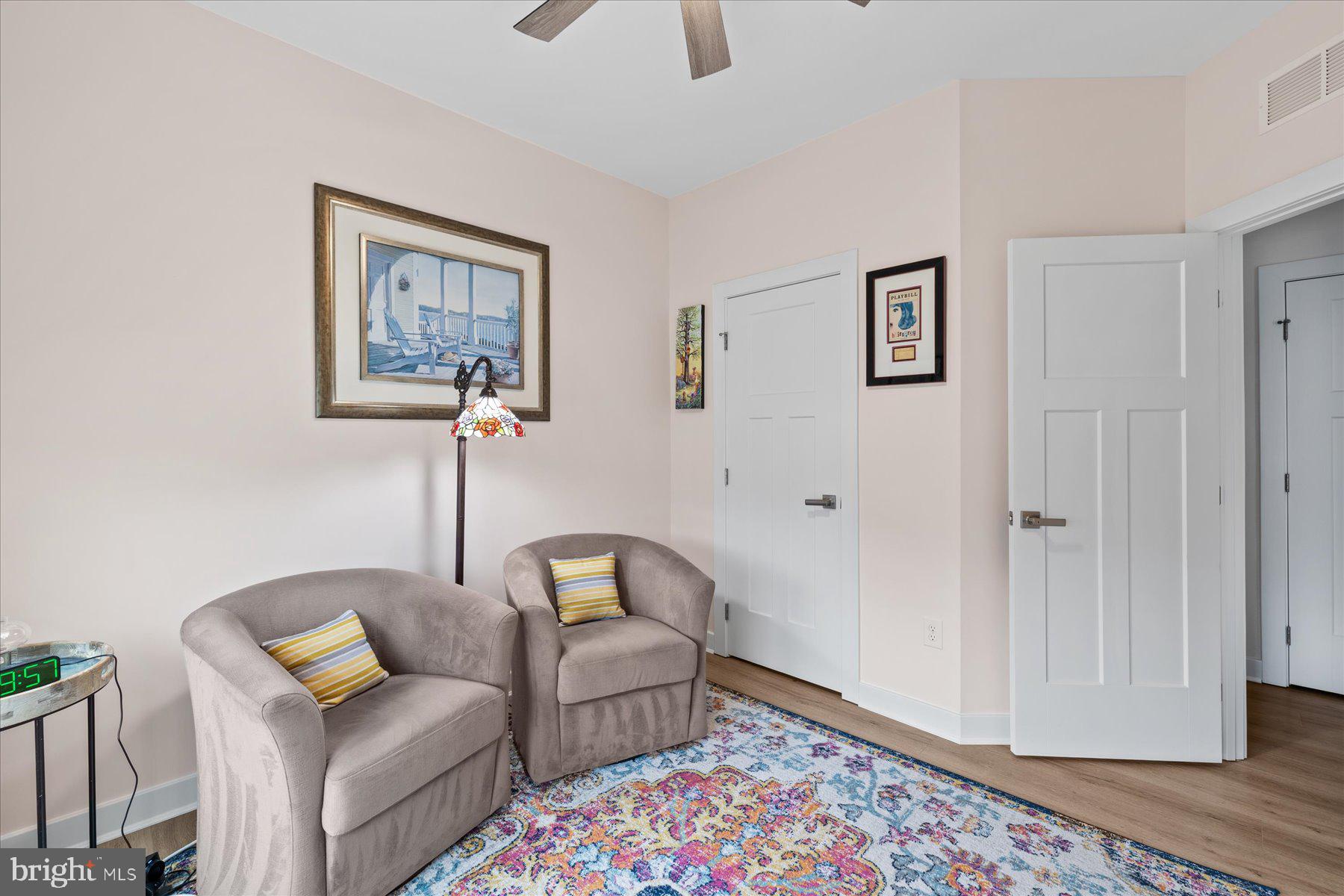 37333 Kestrel Way Ocean View, DE 19970 - Photo 18 of 48 a living room with furniture and a rug