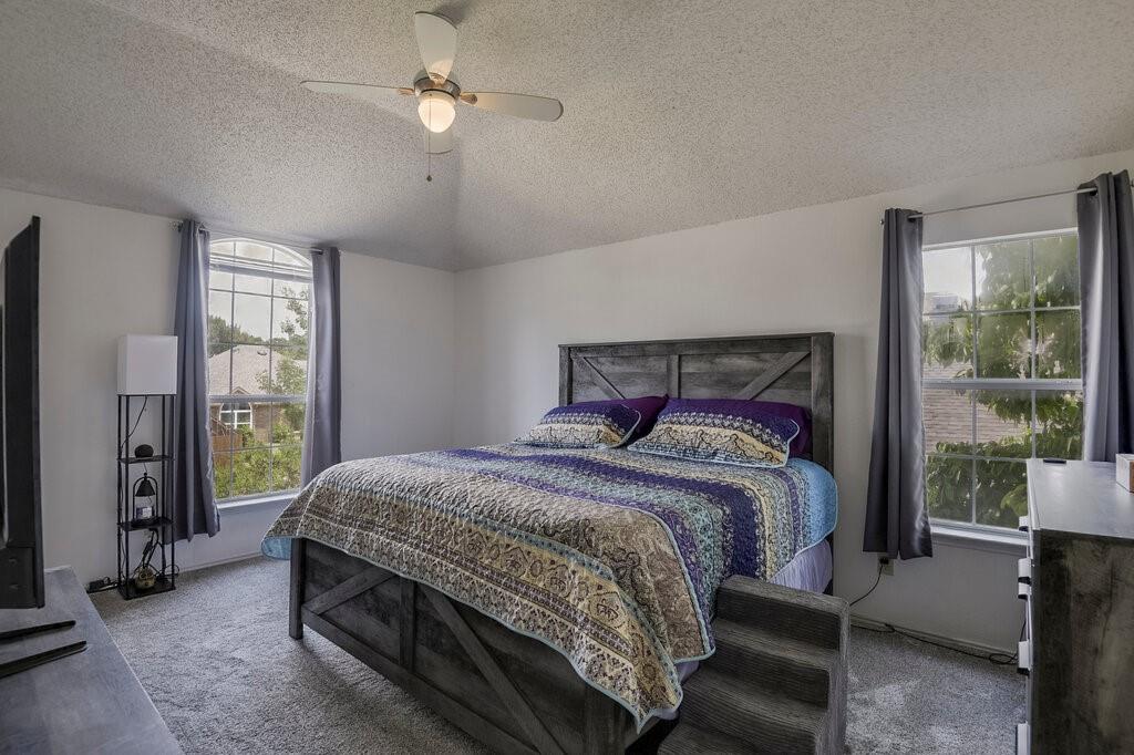 5428 Rolling Green Road Arlington, TX 76017 - Photo 16 of 29 Primary bedroom has high ceilings and plenty of space