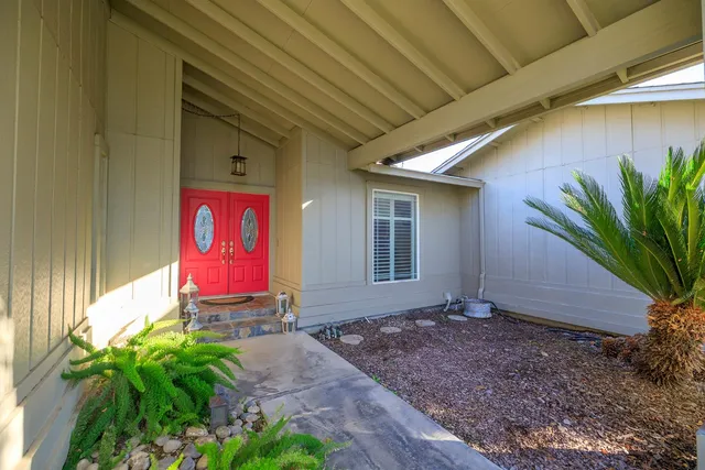 a sign that is on the side of the house