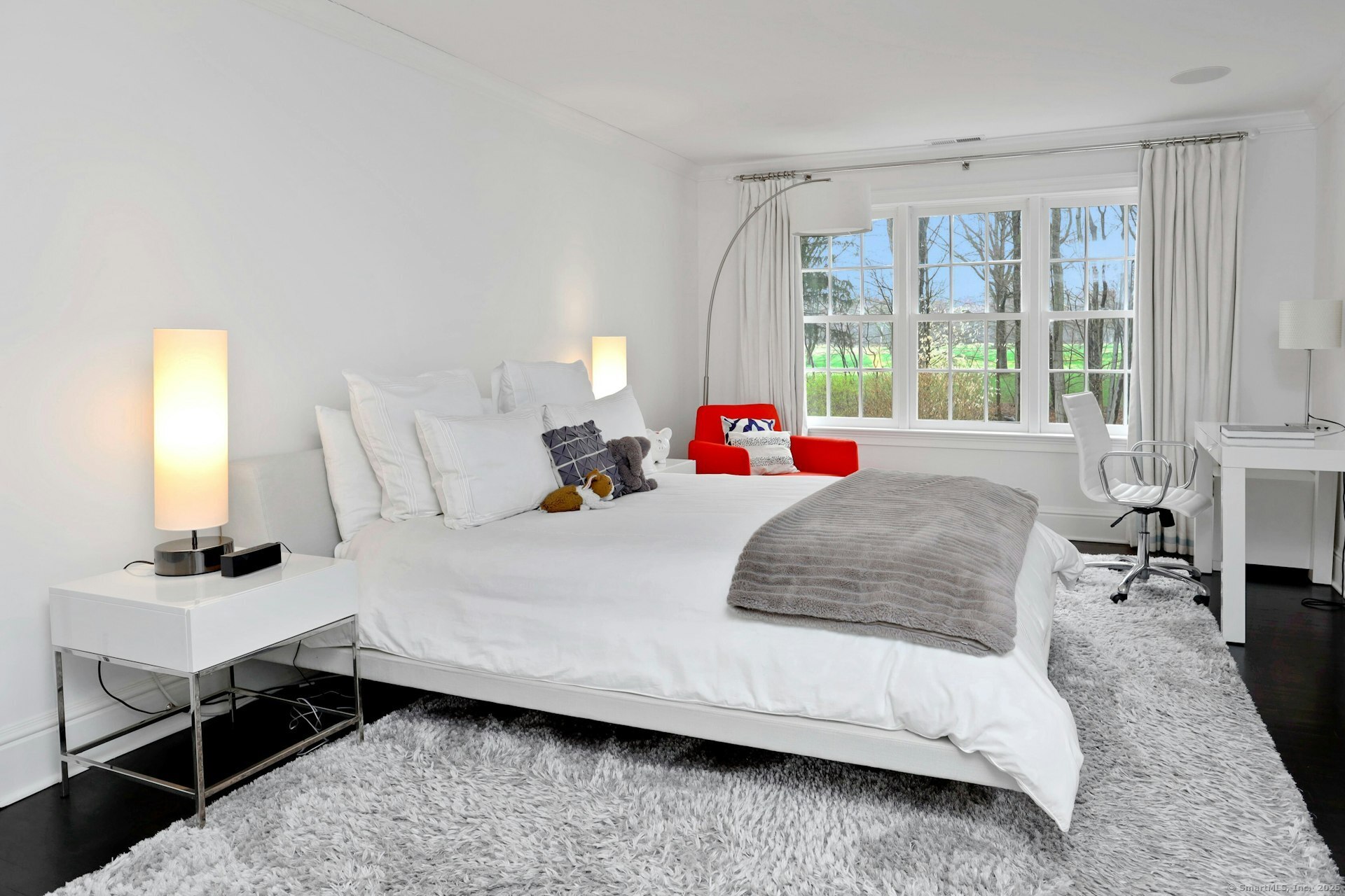 75 Hanson Road Darien, CT 06820 - Photo 22 of 30 a bedroom with a bed and a window