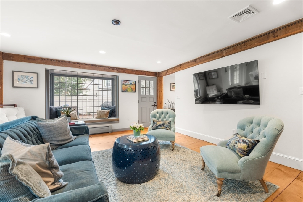 41 Longmeadow Road Wellesley, MA 02482 - Photo 16 of 41 a living room with furniture and a flat screen tv