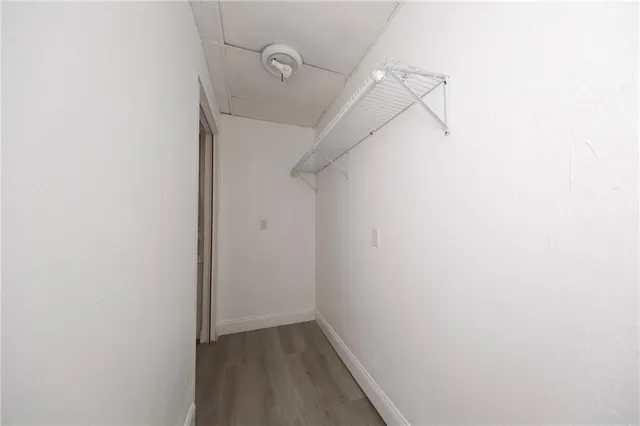 a bathroom with a toilet sink and shower