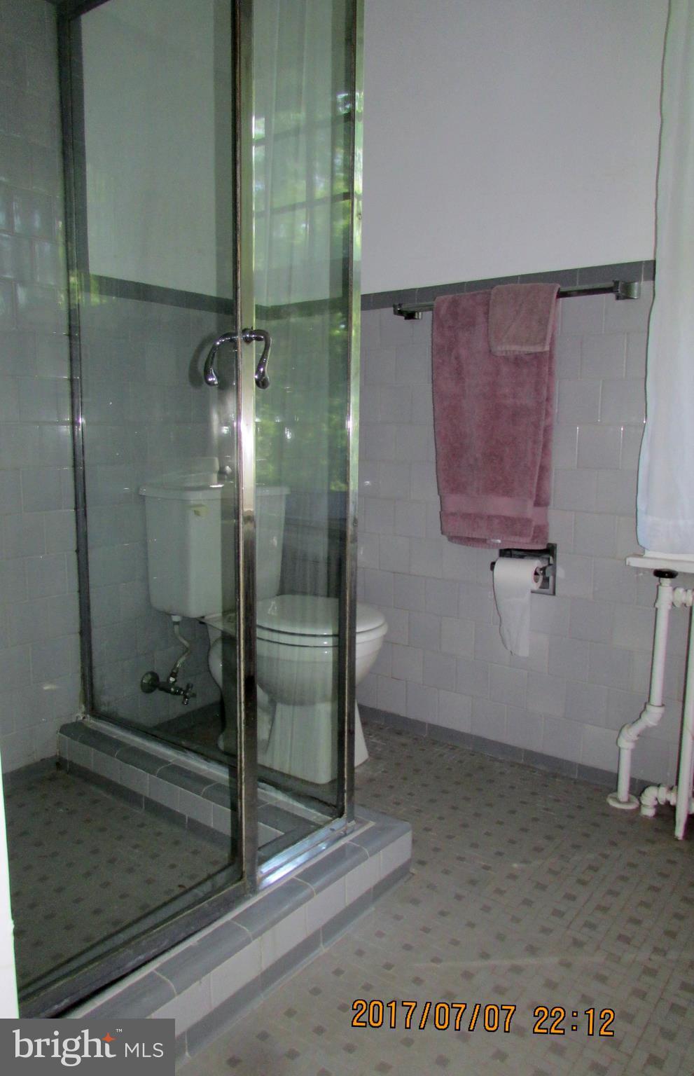 2613 Talbot Road Baltimore, MD 21216 - Photo 22 of 26 a bathroom with a shower
