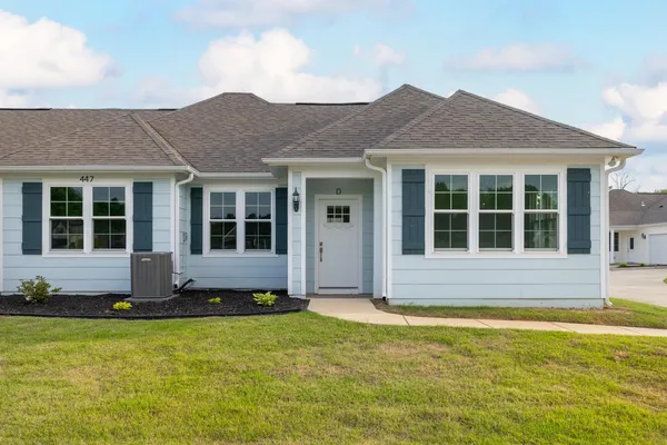 a house view with a garden space