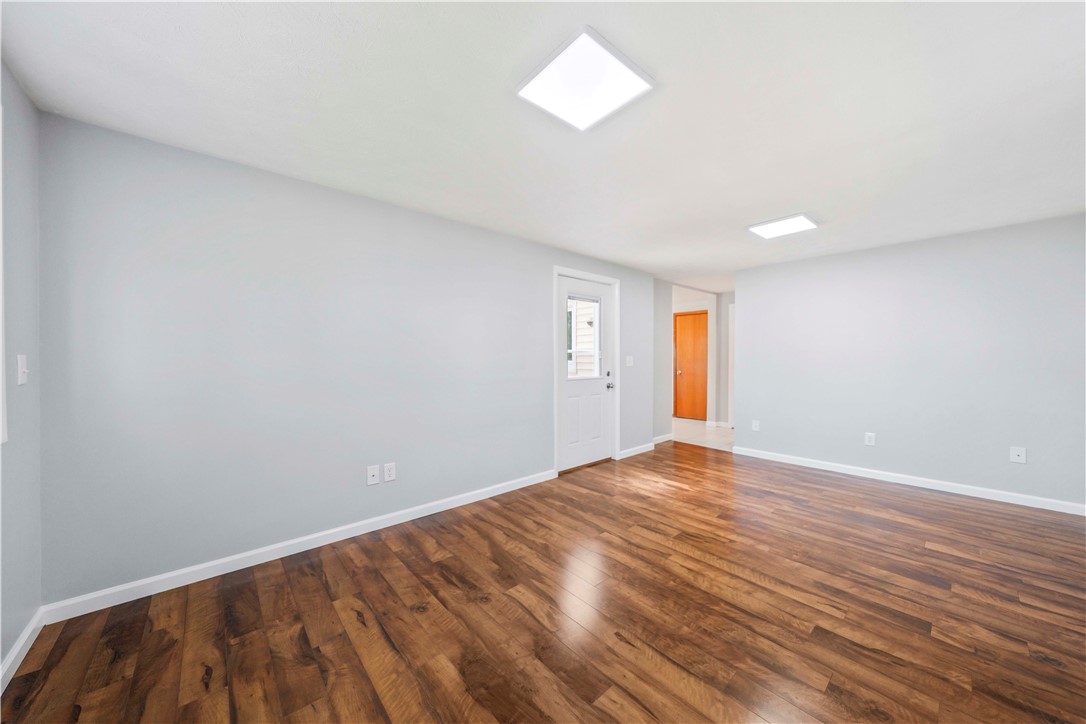 118 Queensboro Road Irondequoit, NY 14609 - Photo 15 of 40 Family room leads to back deck