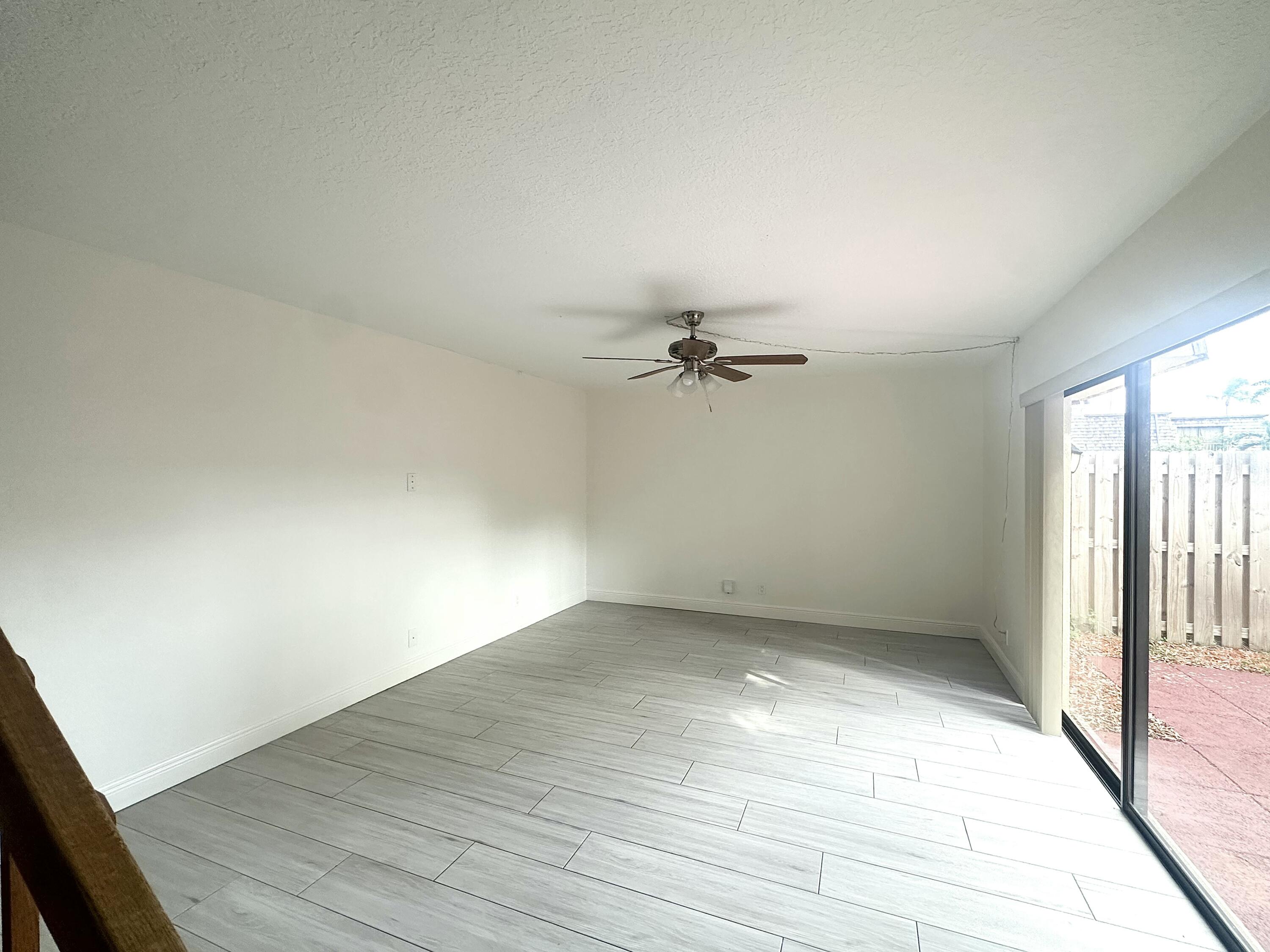 282 Arabian Road Palm Springs, FL 33461 - Photo 12 of 26 a view of empty room with window