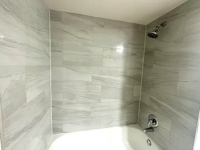 a bathroom with a bathtub