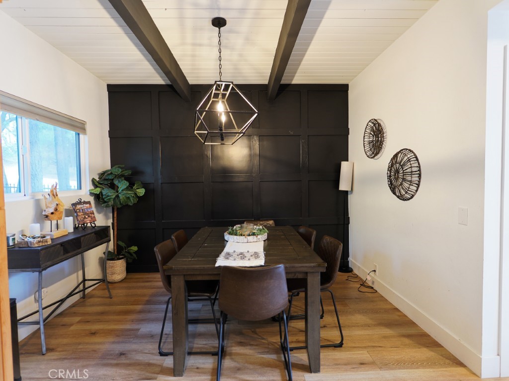 28596 North Bay Road Lake Arrowhead, CA 92352 - Photo 35 of 69 a view of a dining room with furniture and wooden floor