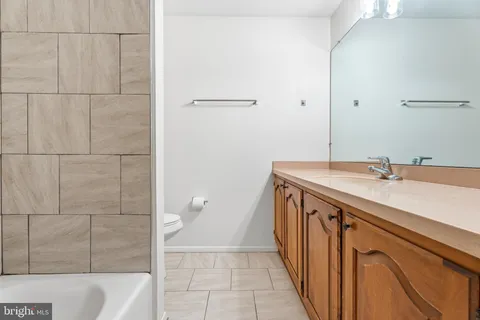 a bathroom with a bath tub and a shower