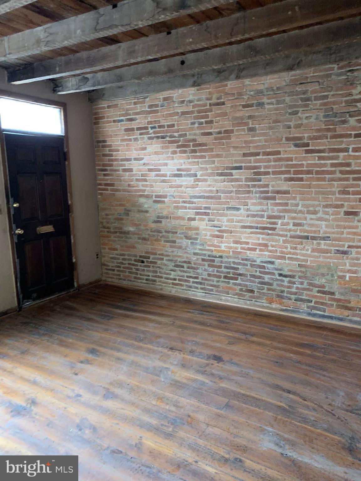 642 Portland Street Baltimore, MD 21230 - Photo 15 of 17 a view of empty room with wooden floor