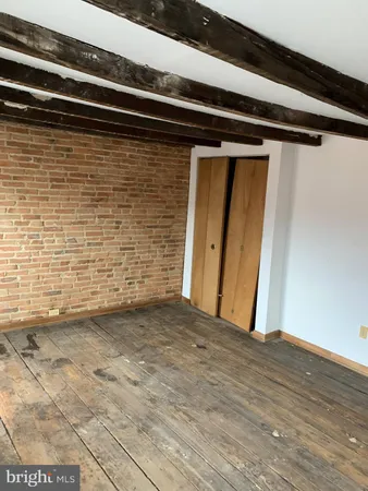 a view of a room with an empty space