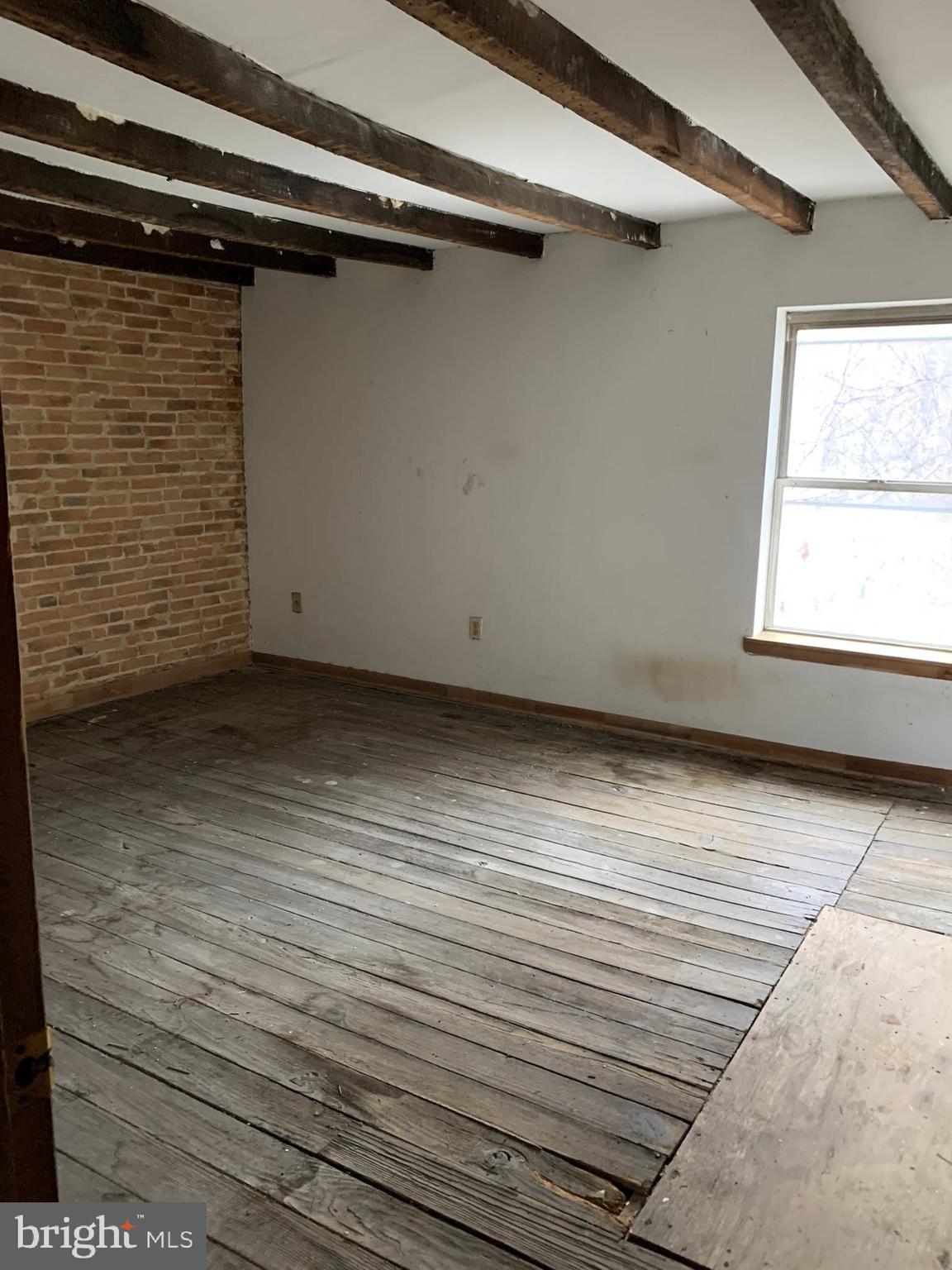 642 Portland Street Baltimore, MD 21230 - Photo 17 of 17 a view of a room with an empty space