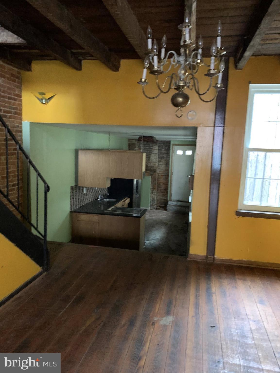 642 Portland Street Baltimore, MD 21230 - Photo 2 of 17 a view of living room with furniture and a window
