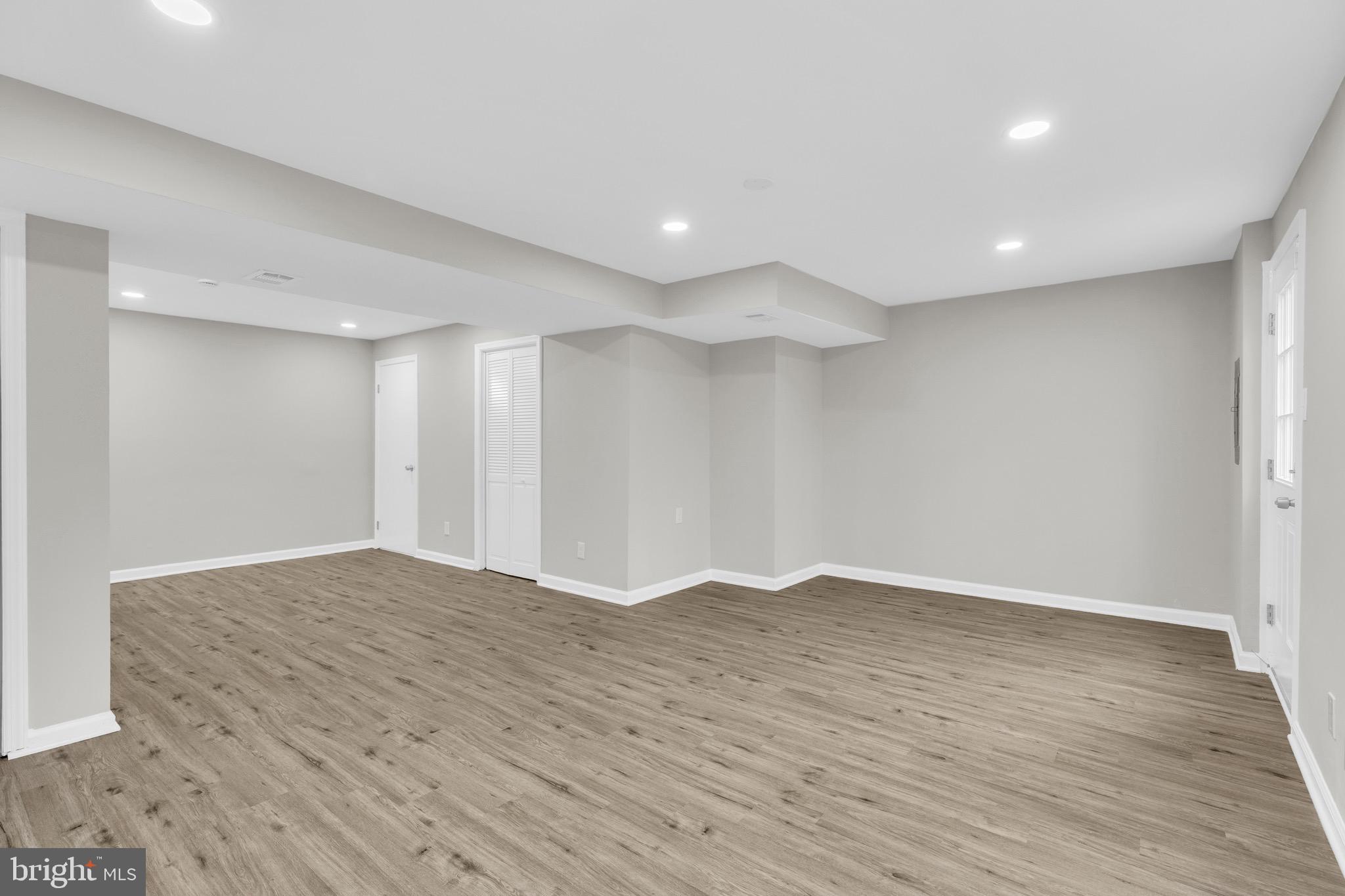 8677 Hickory Ridge Court Springfield, VA 22153 - Photo 25 of 31 a view of empty room with wooden floor