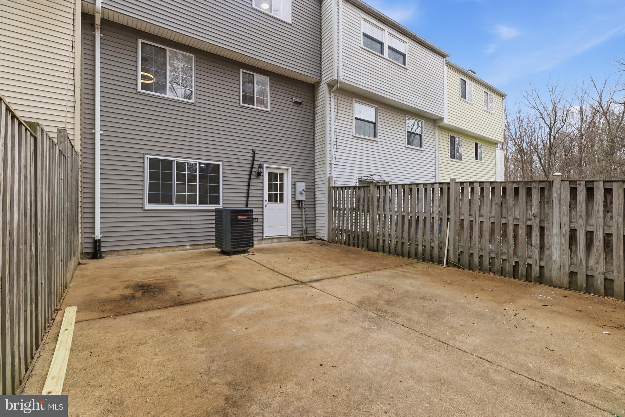 8677 Hickory Ridge Court Springfield, VA 22153 - Photo 30 of 31 a view of a house with a outdoor space