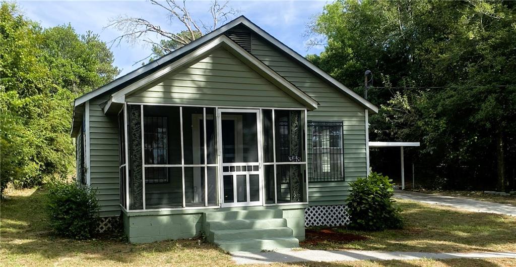 348 Hortman Avenue Macon, GA 31204 - Photo 1 of 18 a view of a house with a yard