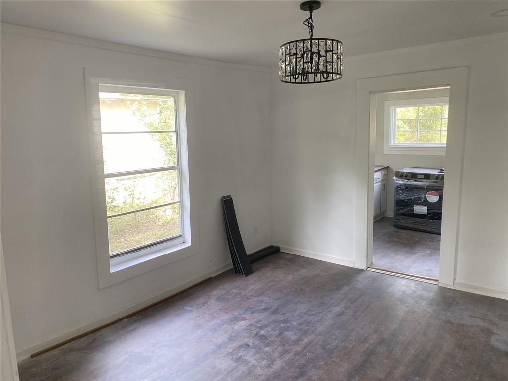 348 Hortman Avenue Macon, GA 31204 - Photo 11 of 18 a view of livingroom with furniture wooden floor and a window