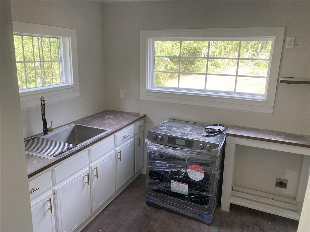 348 Hortman Avenue Macon, GA 31204 - Photo 15 of 18 a utility room with dryer and washer