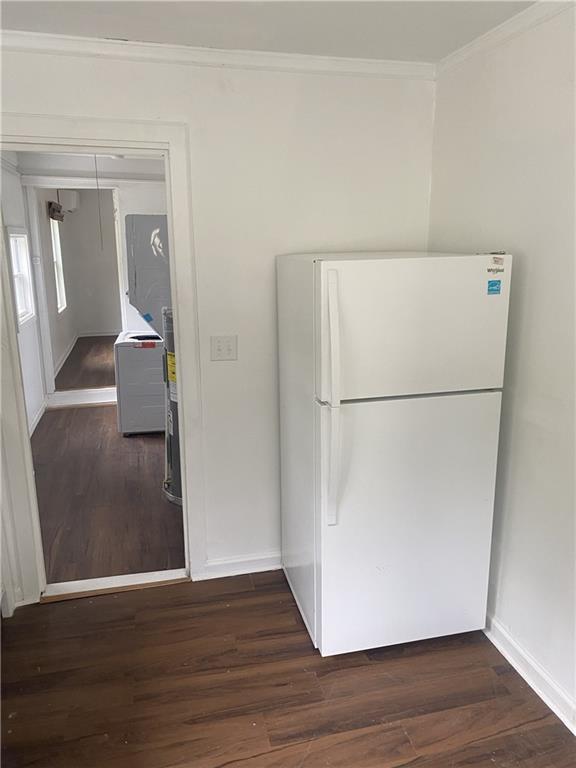 348 Hortman Avenue Macon, GA 31204 - Photo 16 of 18 a view of a refrigerator in kitchen and wooden floor