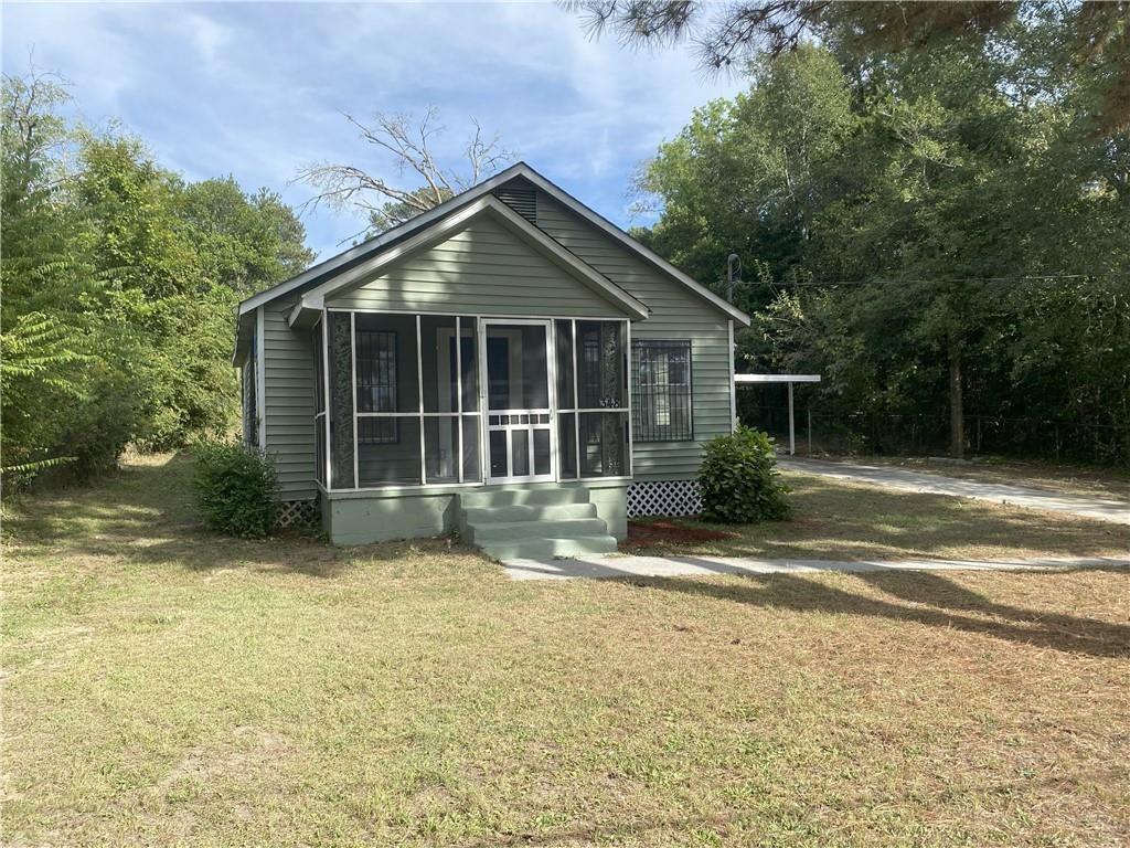 348 Hortman Avenue Macon, GA 31204 - Photo 2 of 18 a view of a house with a yard and large tree