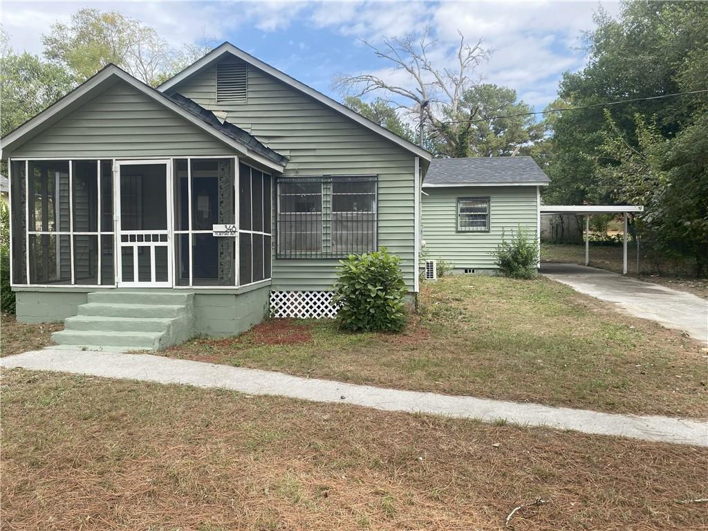 348 Hortman Avenue Macon, GA 31204 - Photo 4 of 18 a front view of a house with garden