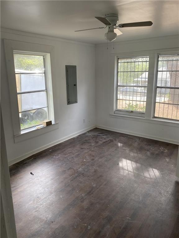348 Hortman Avenue Macon, GA 31204 - Photo 7 of 18 an empty room with a window and wooden floor