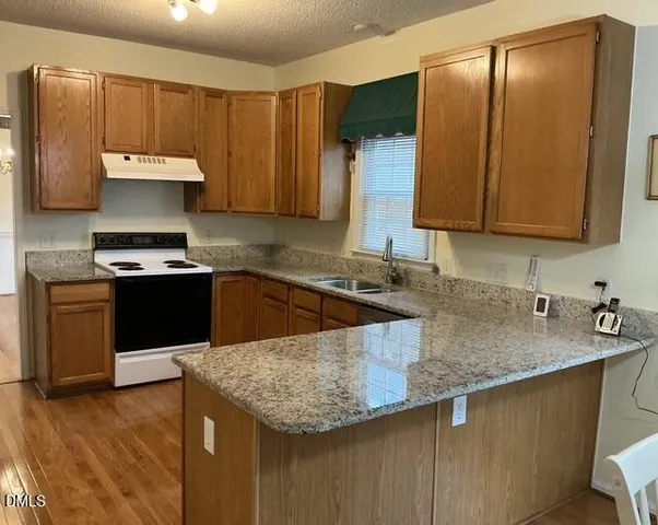 a view of a kitchen with a stove
